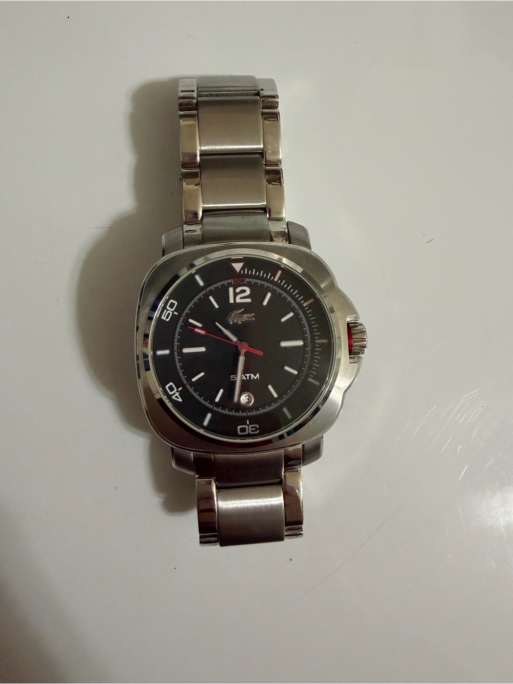 Lacoste Silver Stainless Steel Watch with Black Dial and Red Accents